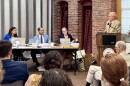 Gov. Kelly Ayotte and Executive Councilors John Stephen and Janet Stevens look on as retired Judge Gerard Boyle answers questions about his $20 million request for New Hampshire's Youth Development Center Settlement Fund. Boyle was named administrator of the fund in March.