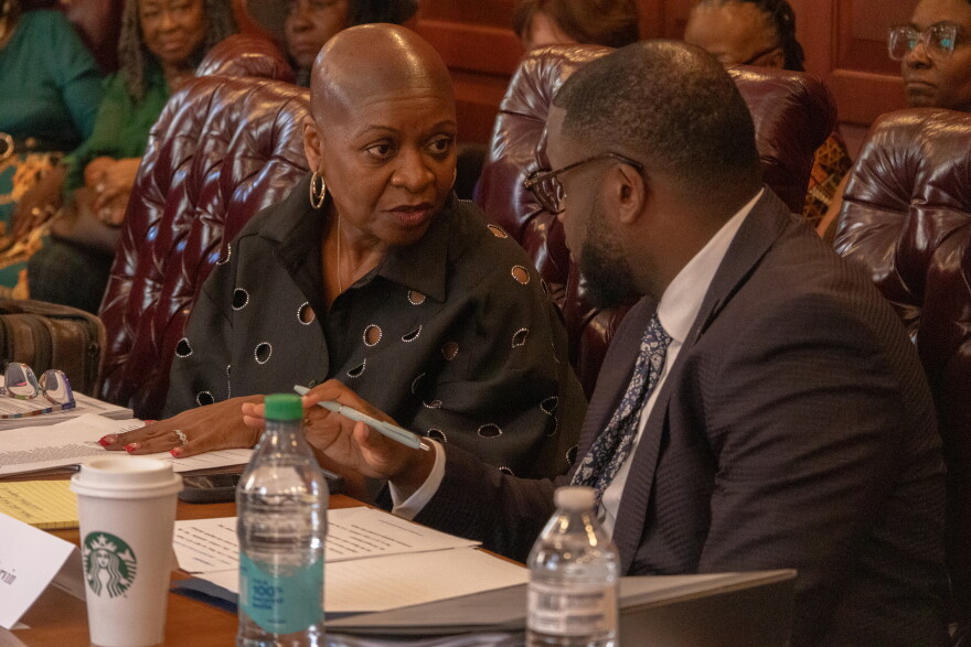 Darlene Dunmeyer-Roberson (left) and attorney state Rep. Kambrell Garvin (right) speak at Monday's hearing in a conference room on the Statehouse grounds.