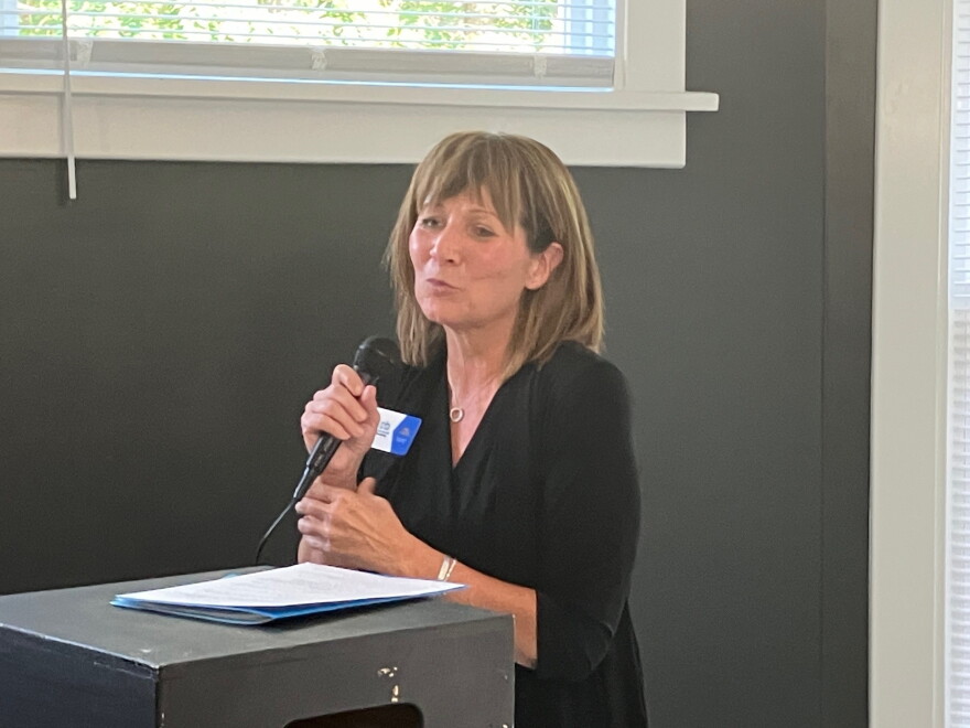 Rejuvenate Housing executive director Ami Porter speaking at the open house Tuesday, Sept. 8, 2026.