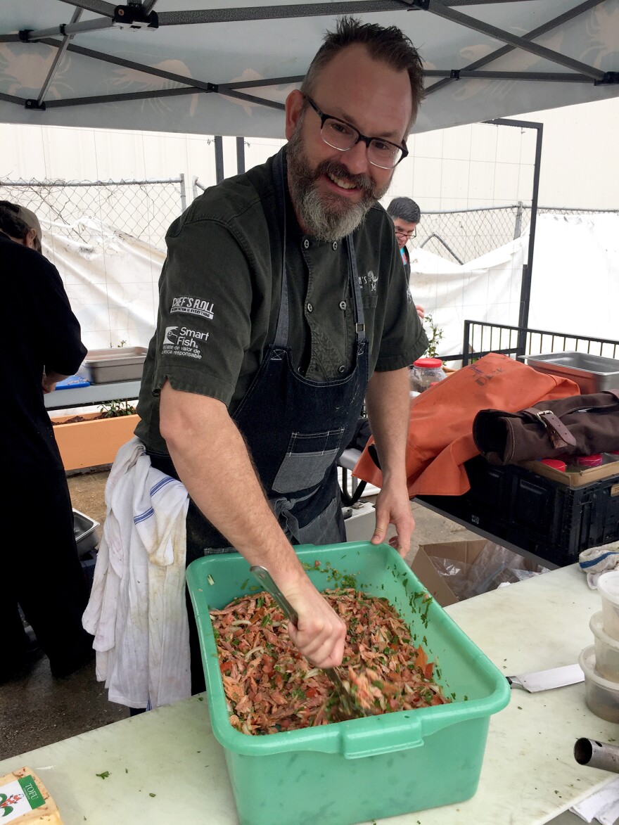 Chef Drew Deckman preps a smoked river trout salad, with fish donated by Slow Fish 2016 participants from California.