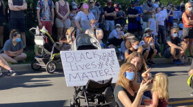 Hundreds gathered Sunday evening for a community prayer event in the Butler-Tarkington neighborhood.