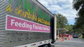 Farm Share held a food distribution event at Fort McCoy in Marion County in June. The non profit is holding a drive through food distribution event in Holden Heights on Saturday. Photo: Joe Byrnes, WMFE