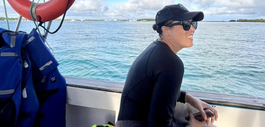 Dr. Nikki Traylor-Jones sits on a boat, looking out at the Atlantic