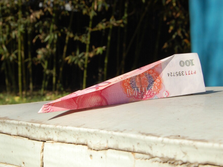 Last week, supporters delivered donations over the wall of Ai's compound in Beijing — 100 yuan notes folded into paper airplanes.