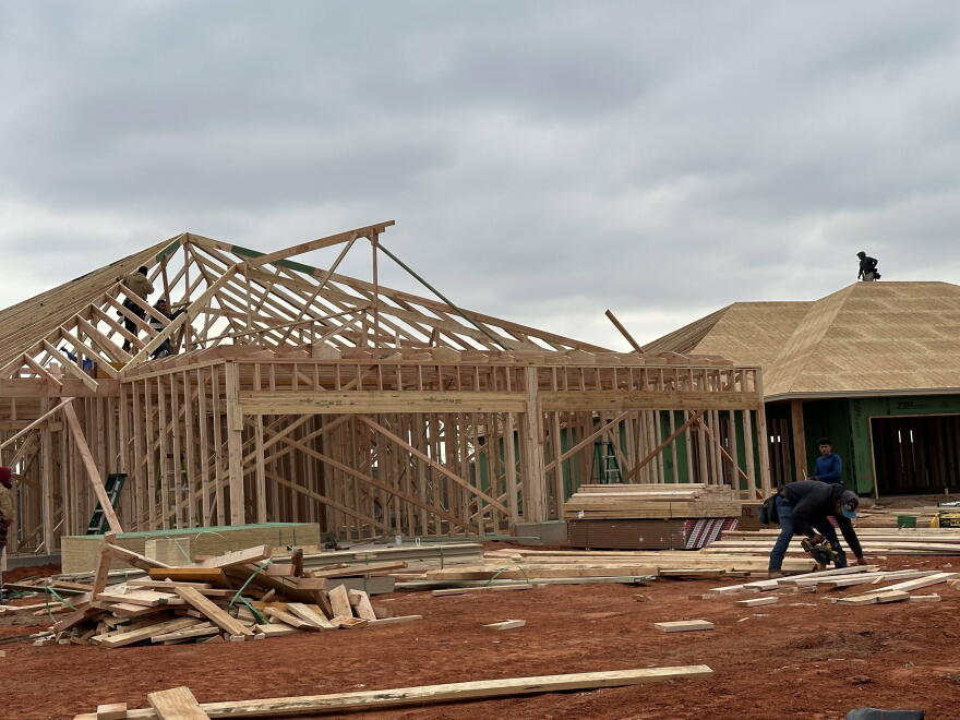 Construction workers frame a duplex in Tuttle. Proponents of State Question 847 say it would help property owners dealing with inflationary pressures, but critics are concerned about budget shortfalls for local governments.