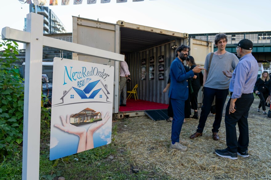 The "New Red Order Realty" office showcases a film of testimonials from people and municipalities who deeded land back to indigenous groups. "I'm so proud of our city, that we were able to make a small amends by returning an island where a massacre, horrible massacre happened," said Eureka mayor Kim Bergel.