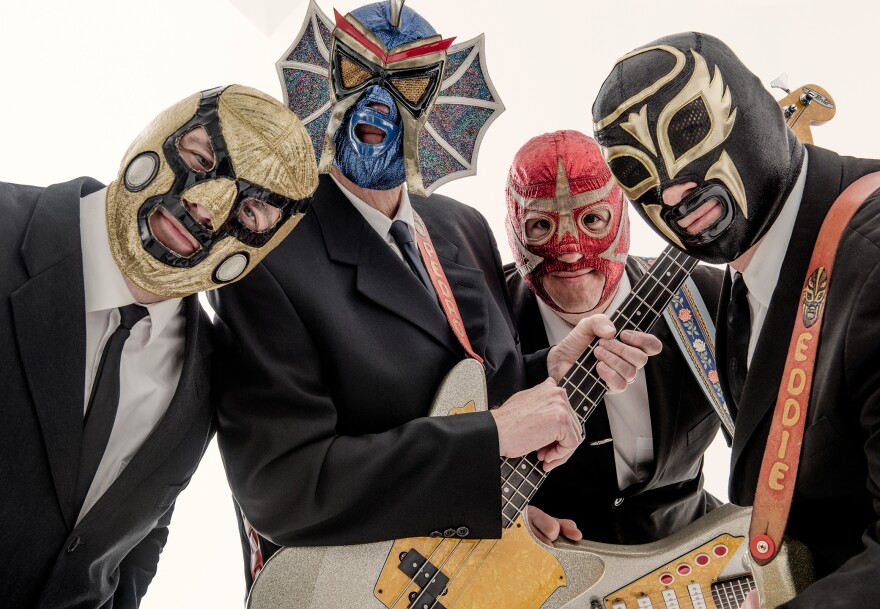 Los Straitjackets -- that's Greg Townson in the red mask.