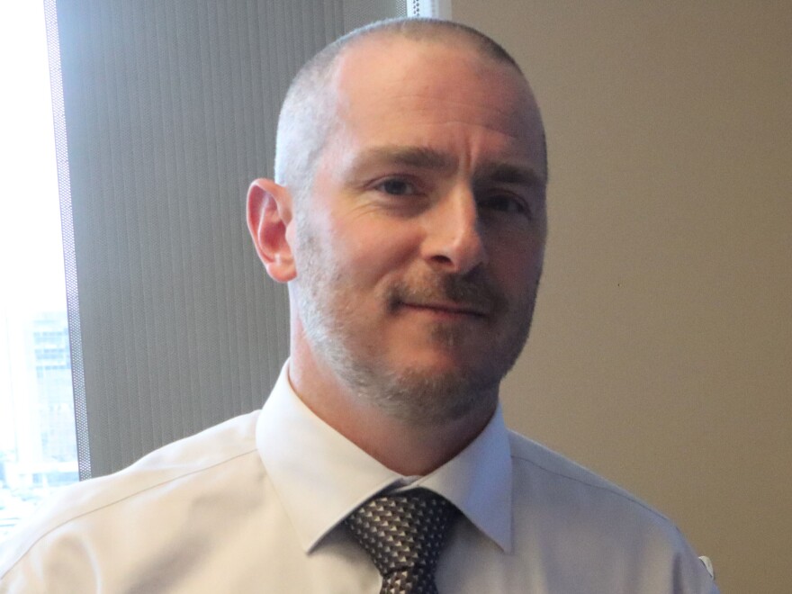A man in a shirt and tie