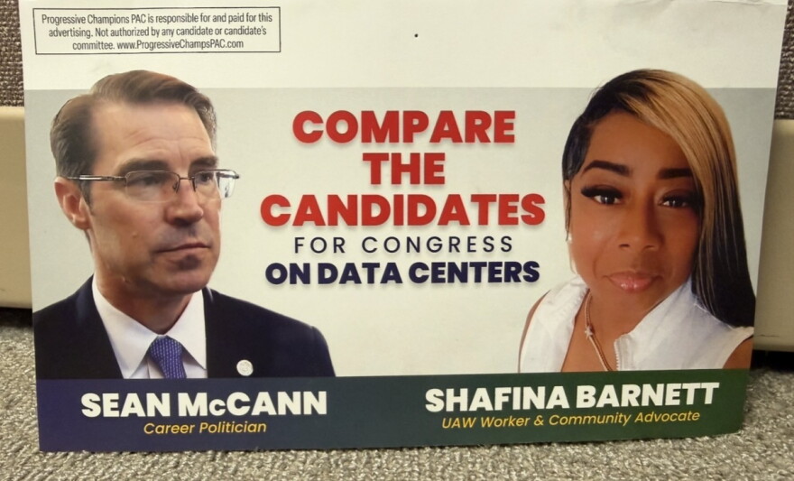 A flyer reads "A closer look at the Candidates for Congress", and shows two side-by-side photos of Sean McCann (left), a white man wearing glasses and a suit, and Shafina Barnett, a Black woman in a white collared shirt. Below the photos, a chart shows claims about each candidate's policies on three topics: Data Centers, taxpayer transparency, and special interest cash. The bottom of the flyer reads: "The Choice is Clear. Only Shafina Barnett Will Put Our Communities Before Big Data Centers".