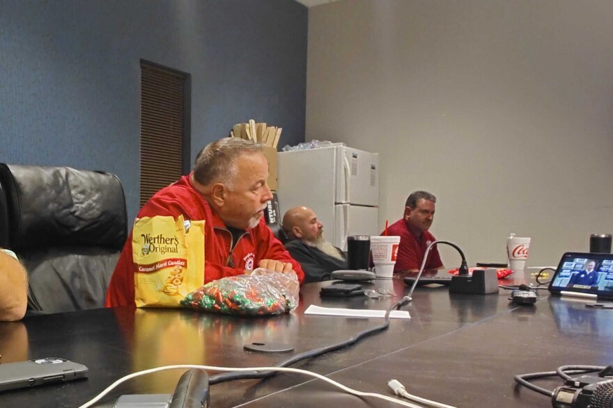 AW Local 685 President Gary Quirk and other local leaders watch the union's international president announces the first plants to strike after the deadline.