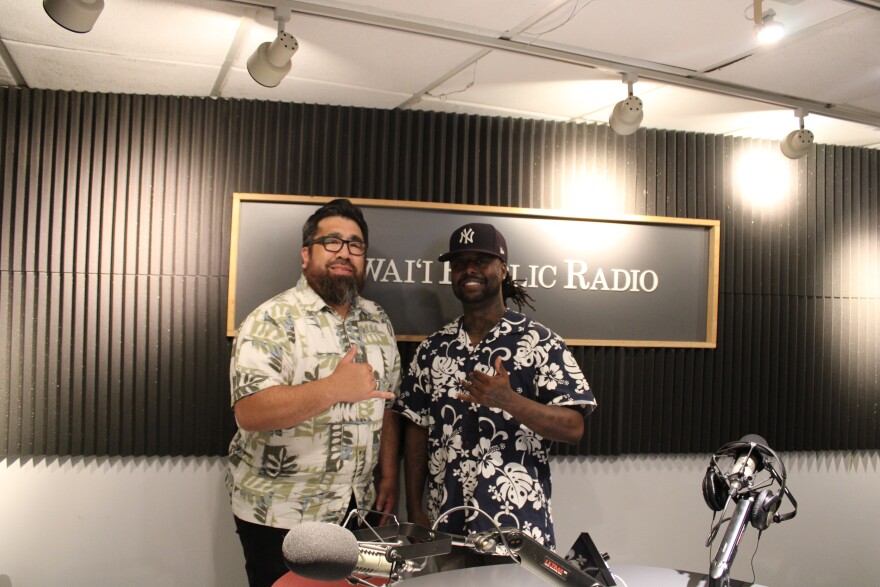 ATGʻs Vincent “Smurff” Holloway, right, with HPRʻs Russell Subiono.