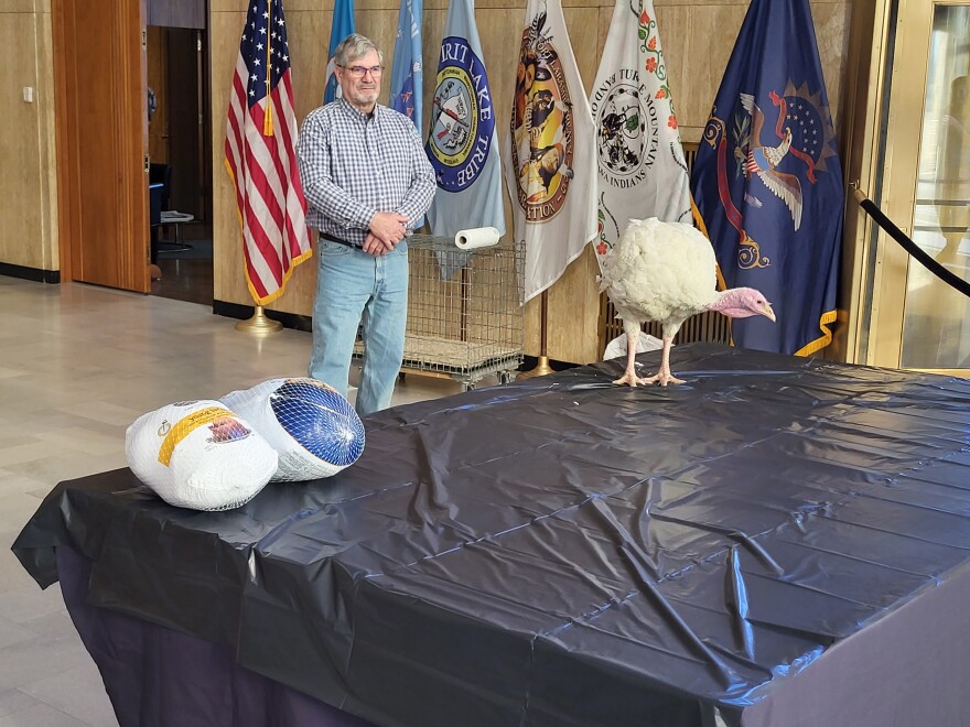 North Dakota Turkey Federation president David Rude, and 'Henrietta"