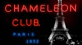 black book cover with neon lighting lettering and Eiffel Tower in background