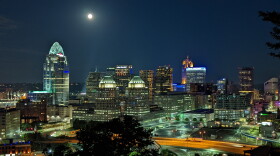 The moon shines over Downtown Cincinnati, early on the morning of July 14, 2022.