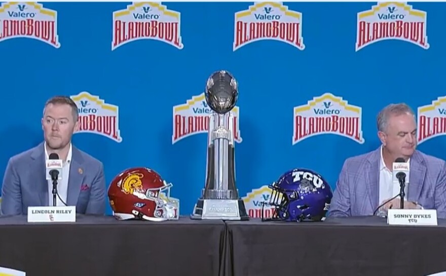 USC coach Lincoln Riley, left, and TCU coach Sonny Dykes, field questions from reporters during a pre-bowl news conference