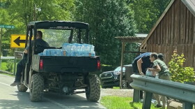 Water being delivered outside of Jackson, Kentucky during a break in the rain Saturday, July 30th