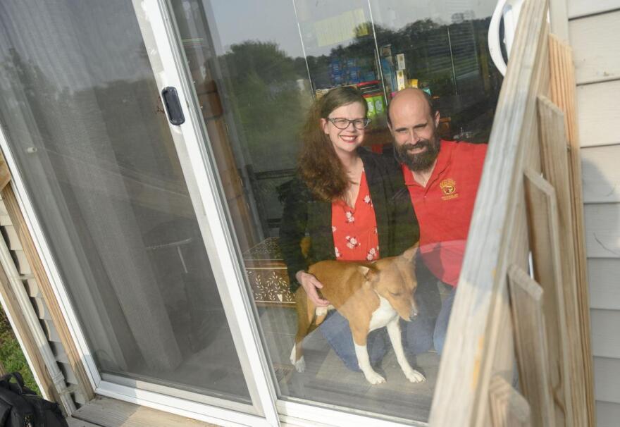 Sara Willette with her husband, Auriel, at their home in Ames, Iowa. Auriel, who has a PhD in biostatistics, helps double checks Sara's calculations.