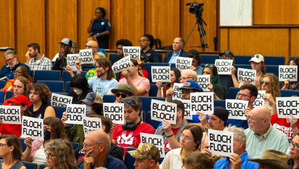 Protesters during City Council meeting