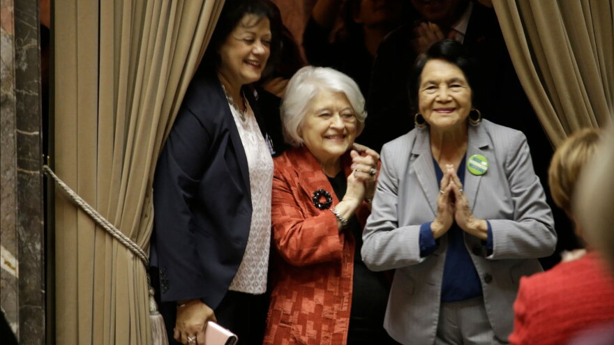 Dolores Huerta, far right, thanks senators after the unanimous vote to designate April 10 as "Dolores Huerta Day," March 18, 2019, in Olympia, Wash.