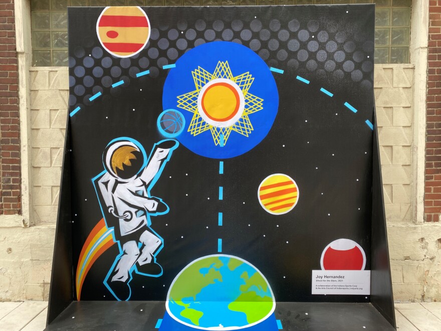 Mural "Shoot for the Stars" by artist Joy Hernandez at 230 S. Pennsylvania St.