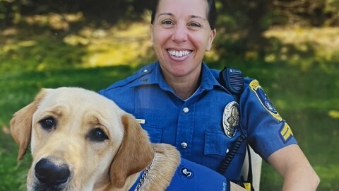 Corporal DiClemente poses with Vinn.