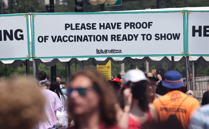 Guests are asked to show proof of vaccination as they arrive for the Lollapalooza music festival on July 29, 2021 in Chicago, Ill.