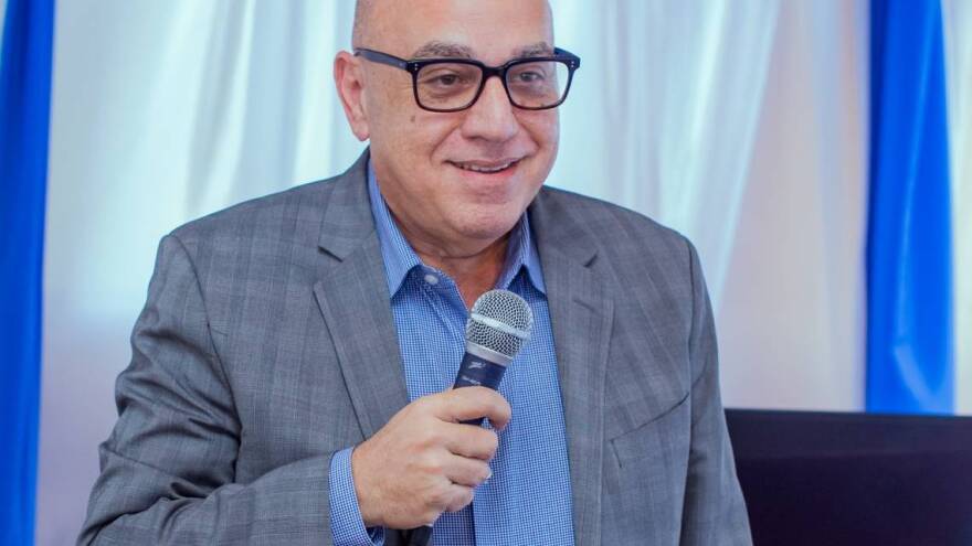 Pierre Reginald Boulos, a politically influential Haitian businessman and physician, is being held on immigration violations in Miami after being arrested by ICE agents at his home in Palm Beach.