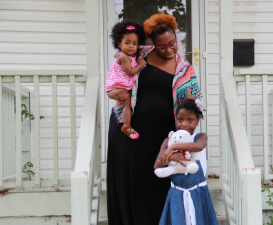 Shana Holliman is pictured here with her two youngest daughters, Corwren, who is 1, and 6-year-old Aleah. Last year Holliman pushed back against officials in the Ritenour School District who were suspending Aleah.