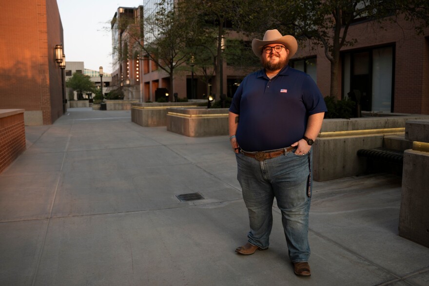 Giles Sims, who is getting a 90-hour bachelor of applied science in communication from Ensign College poses for a portrait on campus in Salt Lake City, Aug. 6, 2026, in Salt Lake City.