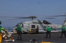 This image provided by U.S. Central Command shows a MH-60R Sea Hawk helicopter preparing to take off from the USS Abraham Lincoln (CVN 72) in support of Operation Epic Fury on Monday, March 2, 2026.