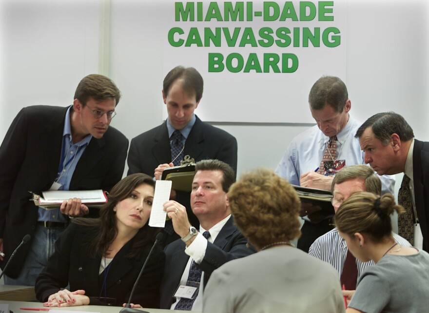 MIAMI,FLORIDAThe MiamiDade Canvassing Board reviewed questionable ballots while a full manual recount began there Monday morning. (Photo by Mark Boster/Los Angeles Times via Getty Images)