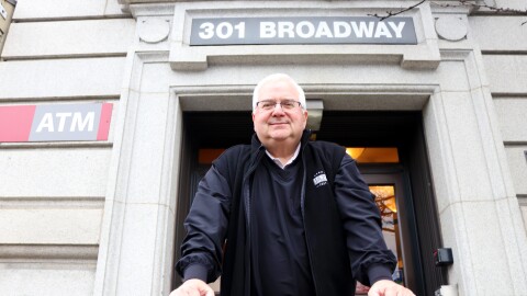 John Ernesto stands outside of the Flatiron Building in Bethlehem, PA, home to WDIY's studios.