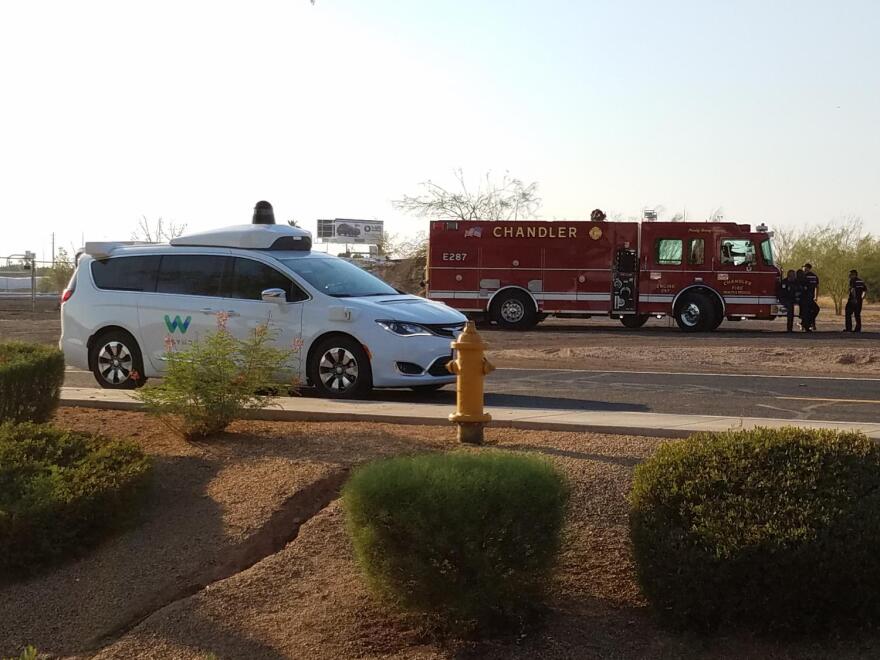 waymo car and fire truck