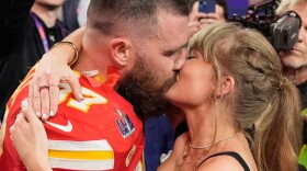 FILE - Kansas City Chiefs tight end Travis Kelce (87) and Taylor Swift kiss after the Chiefs defeated the San Francisco 49ers in the NFL Super Bowl 58 football game on Feb. 11, 2024, in Las Vegas. 
