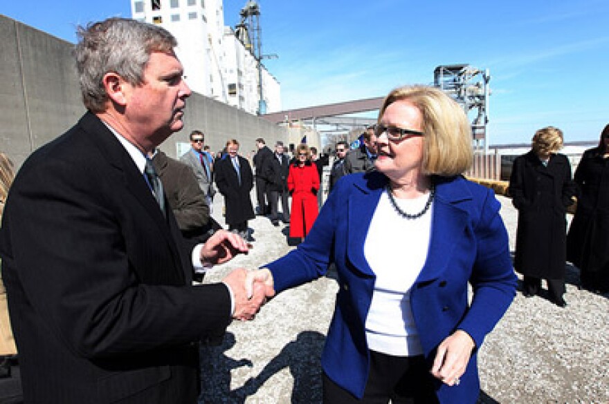 Agriculture Secretary Tom Vilsack bids farwell to Sen. Claire McCaskill (D-Mo) in St. Louis on March 28, 2011, after encouraging an audience of agriculture leaders from Missouri to focus on trade opportunities outside of their borders.