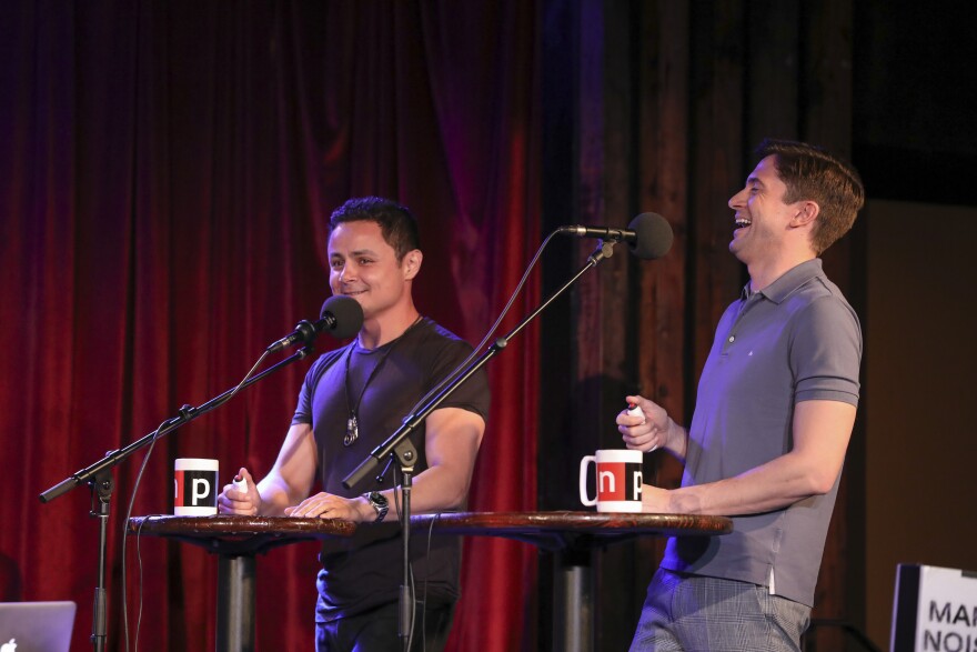 <em>Ask Me Another</em> guests Arturo Castro and Topher Grace at the Bell House in Brooklyn, New York.