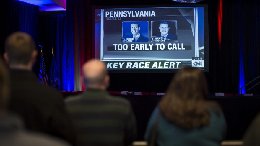 Supporters Democratic congressional candidate Conor Lamb await results on Tuesday night in Canonsburg, Pa. Lamb and Republican Rick Saccone were locked in a race that was declared too close to call hours after polls closed