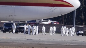 195 U.S. citizens who were evacuated from Wuhan, China, were placed in quarantine at March Air Reserve Base in Riverside County, Calif. New quarantine orders and travel restrictions intended to prevent the spread of coronavirus were announced Friday.