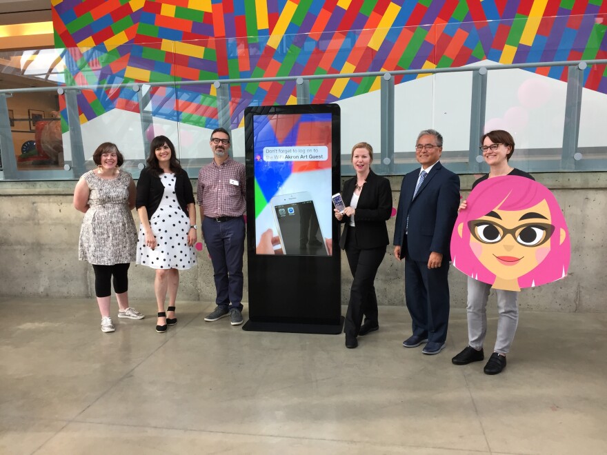 Akron Art Museum staff unveil 'Dot,' the new digital tour guide who is accesible to anyone with Facebook Messenger.