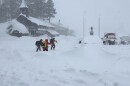 People walking through the snow 