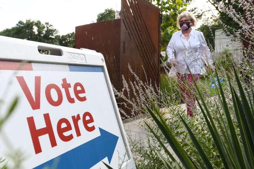 Prairie Village resident Donna Nealey, leaves the Johnson County Arts and Heritage Center polling location in Overland Park on Thursday.