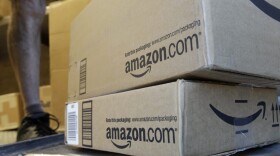 A United Parcel Service driver delivers packages from Amazon in Palo Alto, Calif., Thursday, June 30, 2011. (Paul Sakuma/AP)