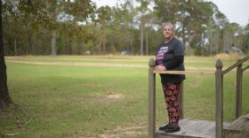 Julie Kerry, on the steps to her home near Colfax, was able to access care for her addition remotely by phone, thanks to emergency changes to federal and state telehealth regulations during the pandemic.