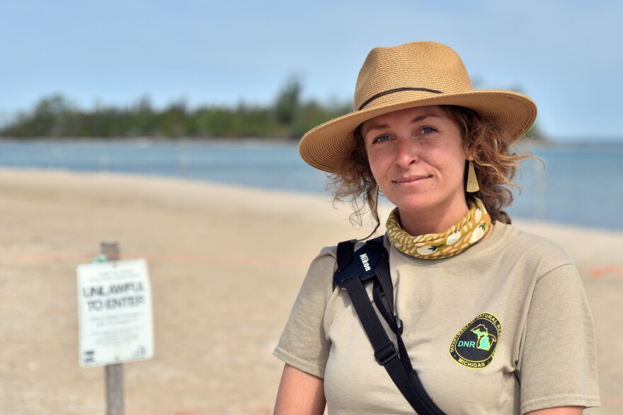  Kailie Sjöblom is watching over a nesting pair of piping plovers at Fisherman's Island State Park near Charlevoix, Michigan.