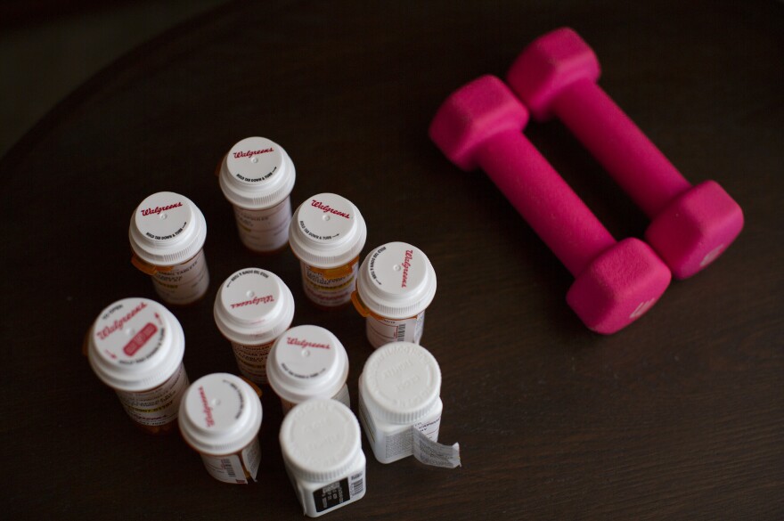 Prescription drugs sit on a table in Trogler's home in St. Louis. She suffers from depression and anxiety because of sexual abuse she suffered as a child.