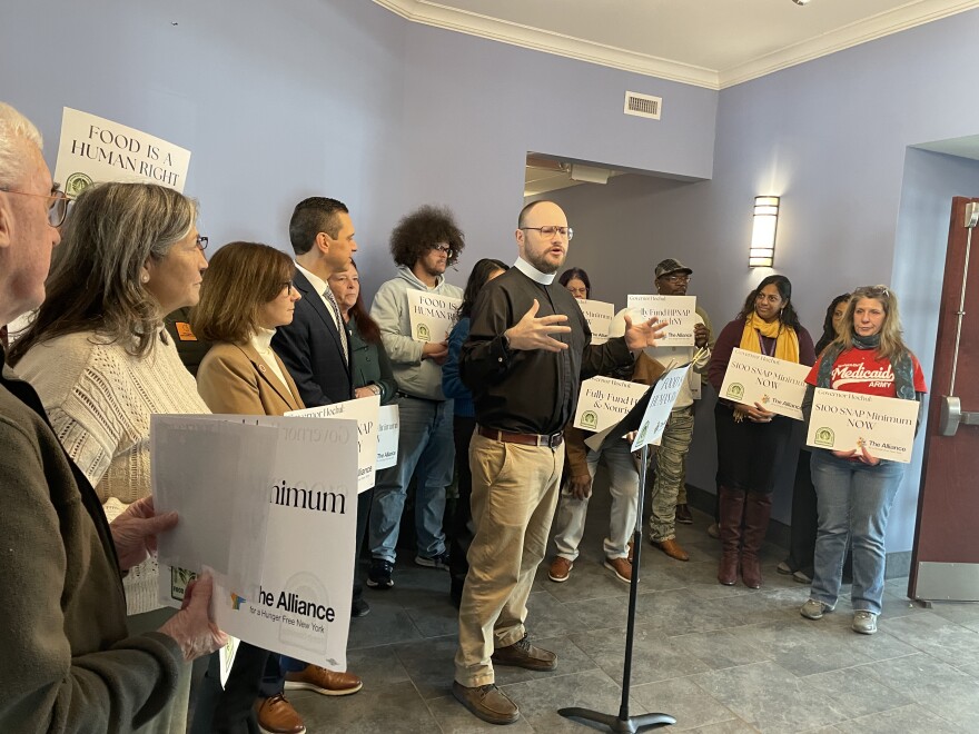 Reverend Dustin Longmire speaking at the press conference on Monday