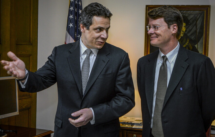 Former Gov. Andrew Cuomo, left, then New York attorney general, introduces Blair Horner, right, as new Policy and Public Integrity special advisor at a news conference in Albany, N.Y., Feb. 22, 2007. Horner, current executive director of New York Public Interest Research Group, said ethics officials should investigate Cuomo's reliance on former aides as he responded to sexual harassment allegations.