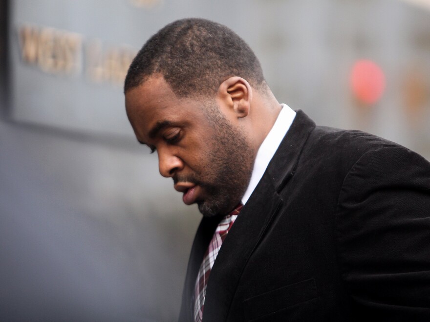 Former Detroit Mayor Kwame Kilpatrick on his way into court in March in Detroit.