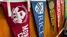 FILE - The Oregon Promise Grant's impact on high school graduate enrollment rates has been muted. Pennants from colleges and universities across the country adorn the office of a Benson High School counselor's office on February 2, 2024.