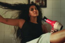 YEИDRY on the music video set for her song